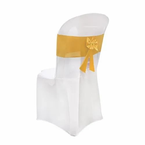 White chair cover with a gold sash